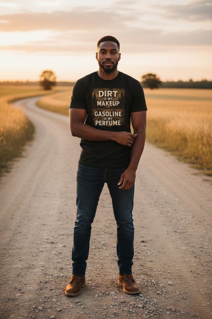 Man standing on a dirt road with fields and sunset in the background