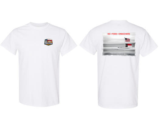 White t-shirt with graphics on the front and back on a white background